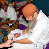  &ndash; Blessing newborns and giving new mom medications in Kabala.......© 2007 NHA photos