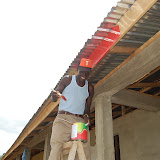  &ndash; Pa Foday painting at school…. © 2008 NHA Media Photos