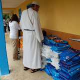  &ndash; Fr. Seraphim looks at the bednets and finds that they were donated free to the country of Sierra Leone but not distributed. We had to purchase them (re-sale) for $8 per net! At least they are now distributed! ...© 2008 Nazareth House Media, JBM photographer