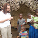  &ndash; Giving out worm medication treatment for the many suffering parasites.....© 2008 NHA photos