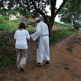  &ndash; Father Seraphim and Vicki Hicks walking up to school...© 2008 September Nazareth House Apostolate Media, James B. Mansaray: photographer
