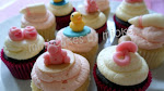 custom made baby shower mini cupcakes - choc jaffa & vanilla buttercream, vanilla & strawberry buttercream with hand crafted sugar decorations ($2.50 per cupcake)