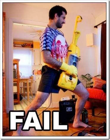 Guitar Fail - Man playing a vacuum  cleaner.