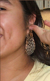 The lionfish earrings bring an exotic look to any outfit.