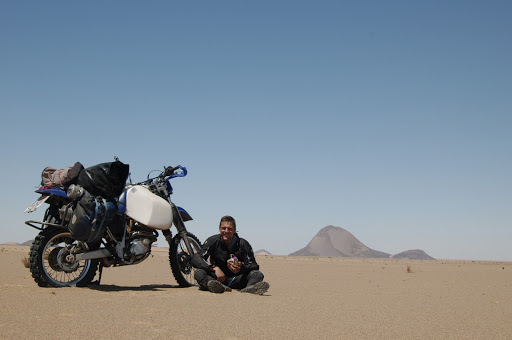 Cookie break in front of the worlds second biggest monolith (after Ayers Rock), visible from 60km afar.