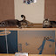 The cats enjoying dads new toy before he gets home