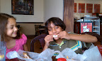 The boy tearing up some wings