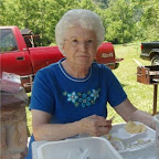 Sue Phillippi eats lunch after everyone is served.