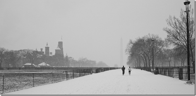 Runners on a Snowy Mall