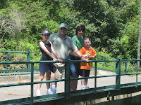 The whole family at a pit stop on a twisty road