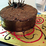 Chocolate Cake. Lots of Chocolate.<br />
This cake was made for Serena's birthday. I did the cake. Kate did the flowers on the top and the plate.