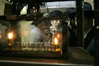 Ultra Orthodox Jewish men light candles on the Jewish holiday of Hanukkah in a Jewish neighborhood of Jerusalem Tuesday, Dec. 4, 2007. Hanukkah is also known as the Festival of Lights, is an eight-day Jewish holiday that celebrates the rededication of the Second Temple at the time of the Maccabee rebellion. (AP Photo/Sebastian Scheiner)