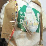 Boy Dummy Wearing Clothing Made of Recyclables