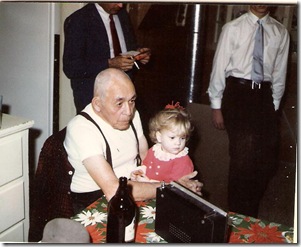 Grandpa really did like me--I love in this pic how he looks all grouchy but his hands are holding me so sweetly. Also, note that the beer's never far away... (click for a larger version)