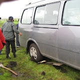 The van got stuck in the mud!