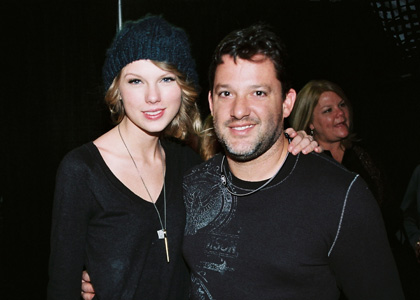 #4340955 Taylor Swift and race car driver Tony Stewart share a laugh and a photo backstage of a country music event in Nashville, TN on January 9, 2010 Fame Pictures, Inc - Santa Monica, CA, USA - +1 (310) 395-0500