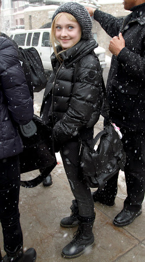 January 22, 2010: Dakota Fanning bares the snowy weather for the Sundance FIlm Festival in Park City, Utah.
Credit: Eric Brogmus/INFphoto.com  Ref.: infusla-55/82
