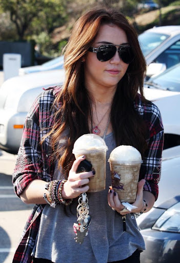miley-sexy-ripped-black-jeans (19).jpg
