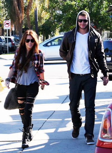 miley-sexy-ripped-black-jeans (26).jpg