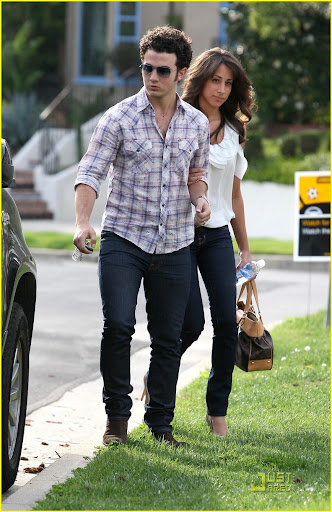 Kevin Jonas acts like the perfect gentleman, opening the car door for his new wife Danielle in Toluca Lake, as they leave his parents home
Los Angeles, California - 21.03.10
Mandatory credit: WENN.com