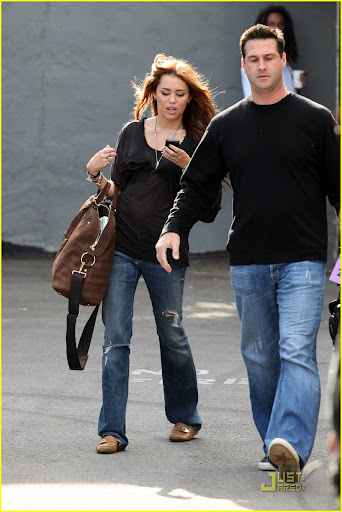 204 Studios, Hollywood, CA -  Miley Cyrus spent the day at a photo shoot at 204 Studios, where she was visited by both her parents, Billy Ray and Leticia Cyrus.  Billy Ray brought his dogs, and "Tish" had Miley's new pup, Mate.  When Miley left the studio she drove away in her Mercedes SUV, and we couldn't help but notice her three blonde dolls displayed on her dashboard.GSI Media     April 12, 2010Steve Ginsburg(310) 505-8447(323) 646-2486 Keith Stockwell(310) 261-8649 steve@ginsburgspalyinc.com sales@ginsburgspalyinc.com ginsburgspalyinc@gmail.com keith@ginsburgspalyinc.com