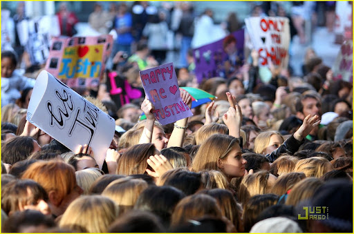 SYDNEY, AUSTRALIA - APRIL 26: A large crowd of Justin Bieber fans pack into Martin Place during the "Sunrise" broadcast at Martin Place on April 26, 2010 in Sydney, Australia. Bieber had been scheduled to perform an outdoor concert in front of the Overseas Passenger Terminal at Circular Quay. However after around 5000 people camped out overnight for the performance, police were forced to cancel the outdoor show after several young fans were crushed during crowd surges. Bieber went ahead and performed at the Seven networks headquarters at Martin Place instead. (Photo by Graham Denholm/Getty Images)