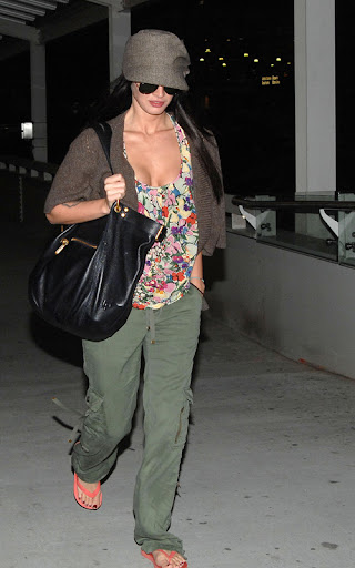 Megan Fox and Brian Austin Green together at the airport. Despite the dark, the Transformers star wore her sunglasses and flip flops as the pair made their way to a waiting limo. <P> Pictured: Megan Fox and Brian Austin Green <B>Ref: SPL117715 050809 </B><BR/> Picture by: Splash News<BR/> </P><P> <B>Splash News and Pictures</B><BR/> Los Angeles: 310-821-2666<BR/> New York: 212-619-2666<BR/> London: 870-934-2666<BR/> photodesk@splashnews.com<BR/> </P>