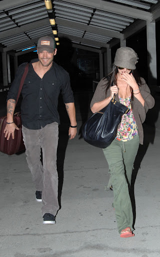 Megan Fox and Brian Austin Green together at the airport. Despite the dark, the Transformers star wore her sunglasses and flip flops as the pair made their way to a waiting limo. <P> Pictured: Megan Fox and Brian Austin Green <B>Ref: SPL117715 050809 </B><BR/> Picture by: Splash News<BR/> </P><P> <B>Splash News and Pictures</B><BR/> Los Angeles: 310-821-2666<BR/> New York: 212-619-2666<BR/> London: 870-934-2666<BR/> photodesk@splashnews.com<BR/> </P>