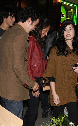 Joe Jonas and Demi Lavato are seen with Kevin Jonas and his fiance Danielle Deleasa