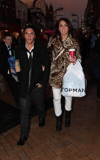 Miley Cyrus leaves the Starbucks in Blackpool, UK, where she will perform tonight for the Queen of England. <P> Pictured: Miley Cyrus <B>Ref: SPL144126 071209 </B><BR/> Picture by: Pete Goddard / Splash News<BR/> </P><P> <B>Splash News and Pictures</B><BR/> Los Angeles: 310-821-2666<BR/> New York: 212-619-2666<BR/> London: 870-934-2666<BR/> photodesk@splashnews.com<BR/> </P>