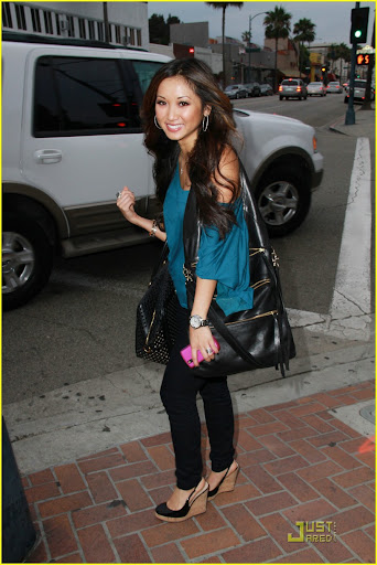 42348, BEVERLY HILLS, CALIFORNIA - Wednesday July 7, 2010. Disney actress Brenda Song has her hands full as she leaves Longmi Lashes Salon in Beverly Hills after getting her eyelashes done. The 22 year old "Suite Life of Zack and Cody" star is seen holding a Prada duffel bag, another leather handbag, and her phone as she heads back to her car. Photograph: Greg Tidwell, PacificCoastNews.com**FEE MUST BE AGREED PRIOR TO USAGE** **E-TABLET/IPAD & MOBILE PHONE APP PUBLISHING REQUIRES ADDITIONAL FEES** UK OFFICE:+44 131 557 7760/7761 US OFFICE:1 310 261 9676