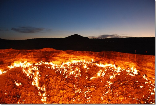 The Darvaza natural gas crater is located in the center of the Karakum Desert in the central Asian country of Turkmenistan. The crater resulted after a Soviet natural gas exploration accident in the 1950s and has been burning ever since. The crater is approximately 60 meters in diameter and its depth is approximately 20 meters. (Photo and caption by Natalja Silver) The Darvaza natural gas crater is located in the center of the Karakum Desert in the central Asian country of Turkmenistan. The crater resulted after a Soviet natural gas exploration accident in the 1950s and has been burning ever since. The crater is approximately 60 meters in diameter and its depth is approximately 20 meters. (Photo and caption by Natalja Silver)