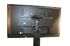 Die Rückansicht des IQ-Automation Flatman Panel PC auf Metallständer Die Rückansicht des IQ-Automation Flatman Panel PC auf Metallständer