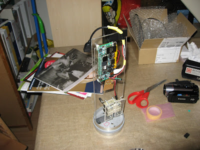 The Gumstix Overo Fire on the Tobi expansion board mounted on the internal frame of the rocket.