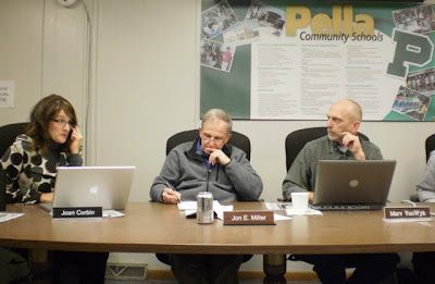 Pella School Board Members (L to R) Joan Corbin, secretary Jon Miller, and president Marv Van Wyk