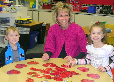 Lincoln Elementary pre-kindergarten teacher Mary Wisniewski with students