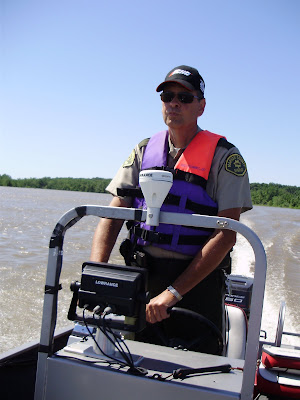 Chief Deputy Mel Vander Weil Patrols below the RR Dam during June 2008 flood.
