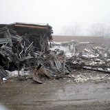 A pile of debris from the demolition of the former Pella Christian High School