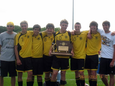 Knoxville High School senior soccer players with state trophy (Photo Courtesy of Cindy Glick)
