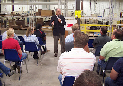 Senator Charles Grassley speaks with 3M employees (Photo Courtesy of Greg Couves)