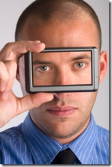 Man holding visual display device