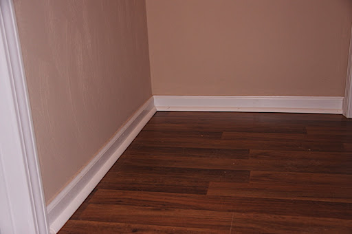 Put down the quarter round on top of the floor to finish it off.