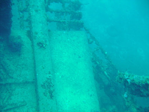 Ladder up to the second level, near the middle of the ship