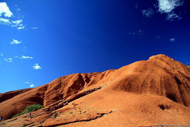 [The climb up Uluru. A handy rail to follow.. and many many people to do it with!.jpg]