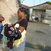Munoz Batey, Giving Clothes. Gracias (93).jpg