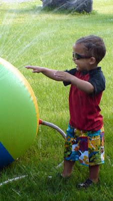 Refreshing run through the sprinkler