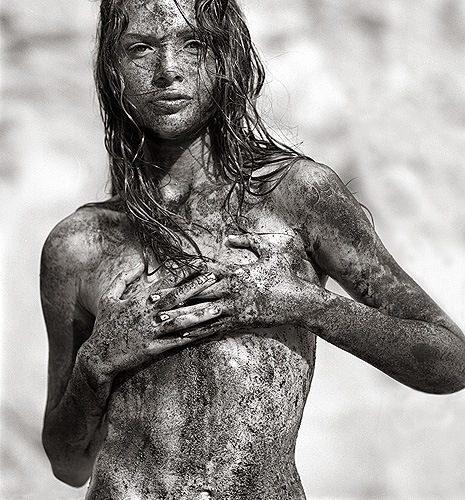 Girl on beach with Bizarre makeup 