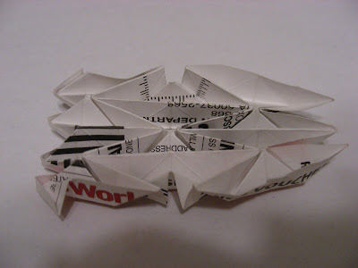 Collapsed triangle base origami accordion bottom view