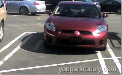 Red Mitsubishi parked rudely - youparkrudely.com