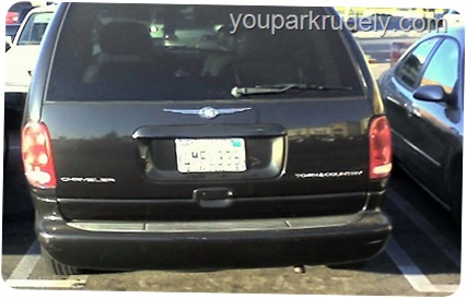 Black Chrysler Town & Country on the line - youparkrudely.com